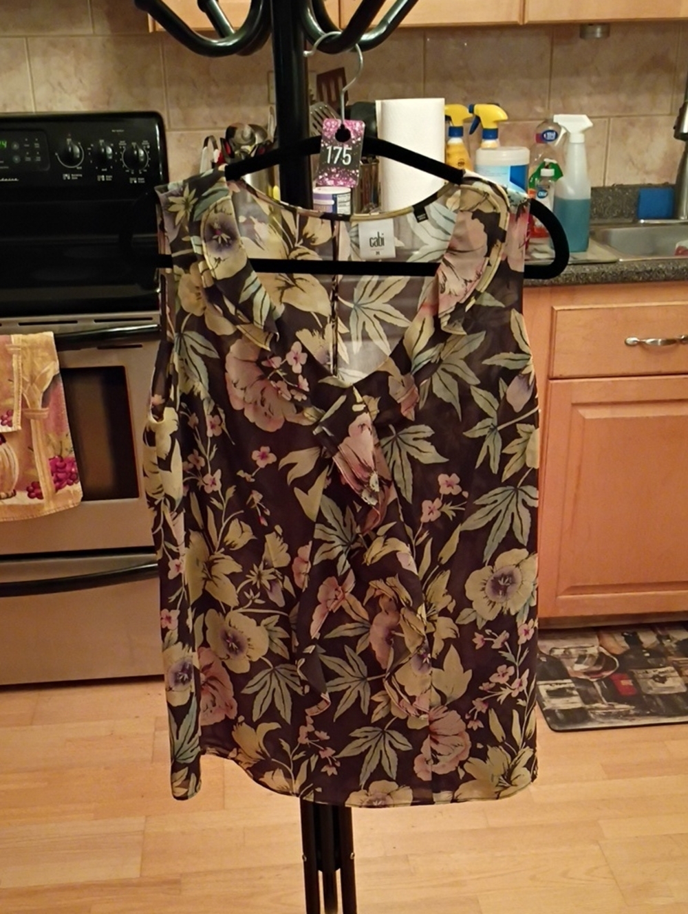 CAbi Black Floral Ruffle-Front Sleeveless Blouse with Pink and Green Accents